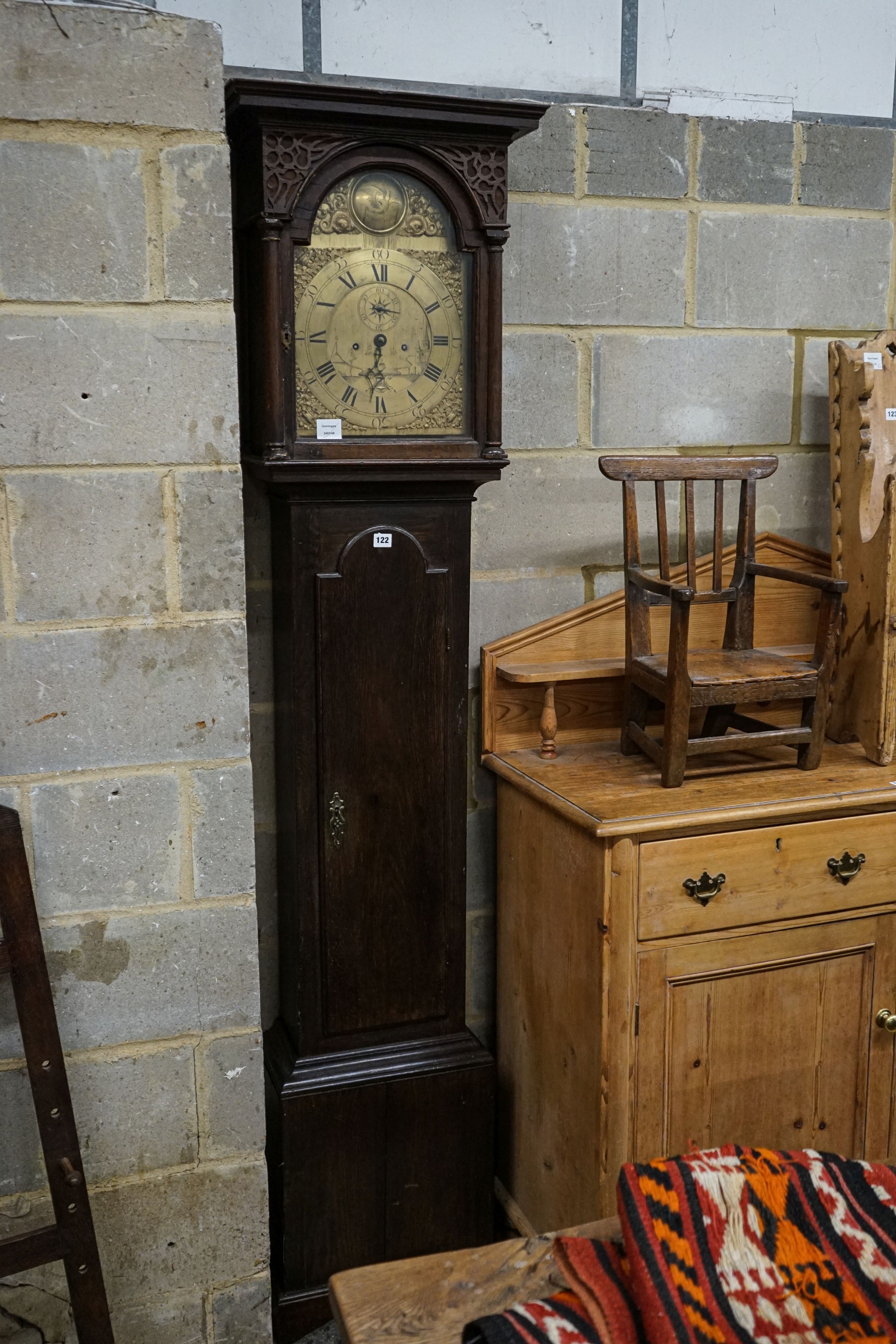 A late 18th century oak eight day longcase clock, with brass Tempus Fugit dial, height 214cm